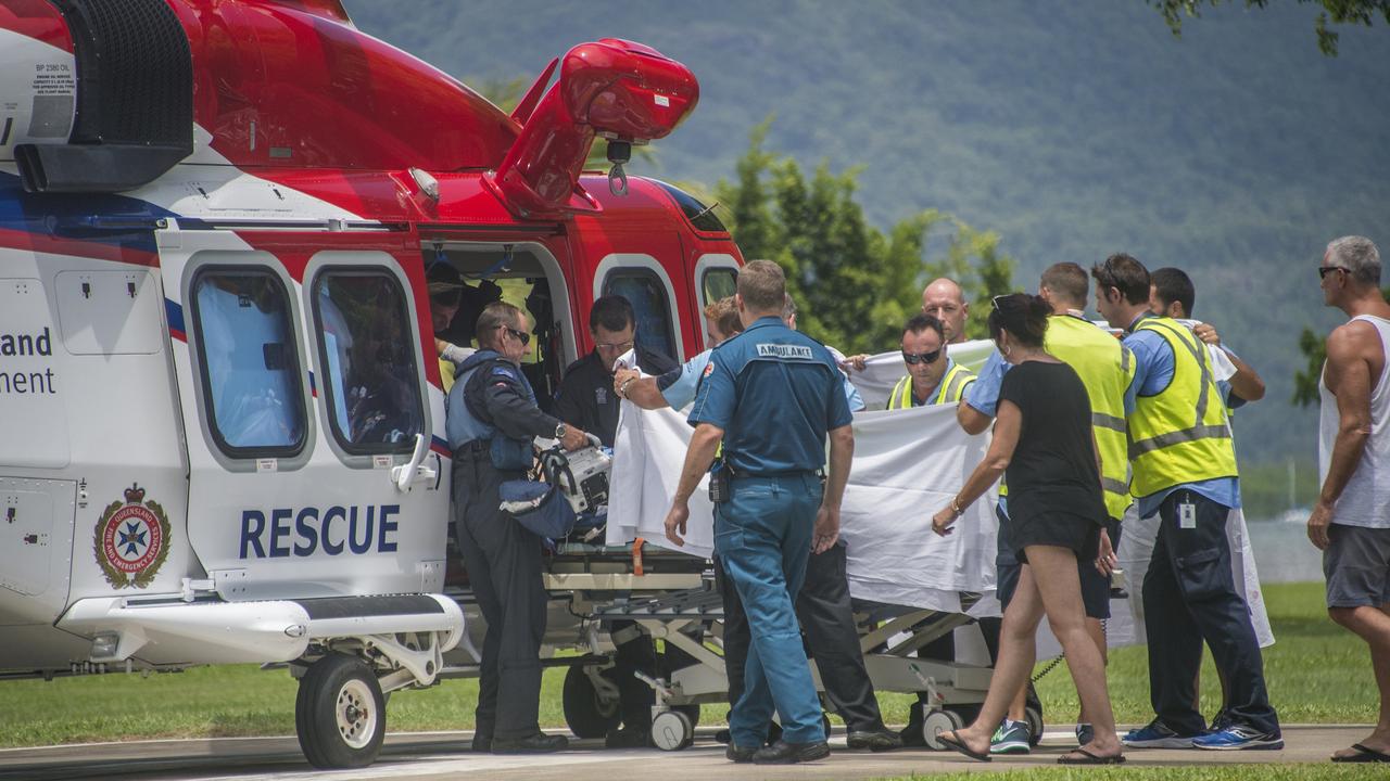 Glenn Dickson was transported from the emergency services helicopter to Cairns Regional Hospital after the brutal attack on February 18, 2017. Picture: Brian Cassey