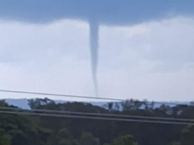 Epic image of waterspout which looks just like a Tornado near Hervey Bay. Picture: Deb Edwards/Facebook