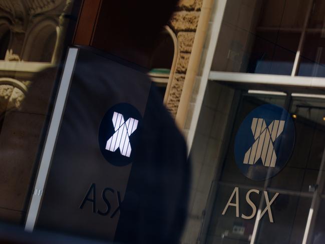 SYDNEY, AUSTRALIA - NewsWire Photos, October 29 2024. GENERIC. Stocks. Finance. Economy. People walk past the Australian Stock Exchange, ASX, on Bridge Street. Picture: NewsWire / Max Mason-Hubers