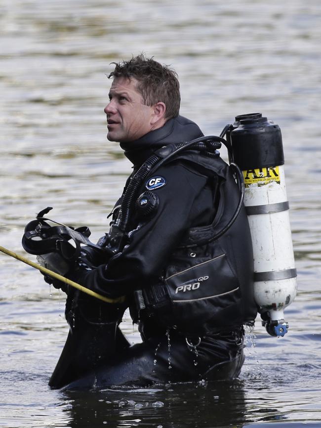 A forearm was recovered by police divers. Picture: Hamish Blair