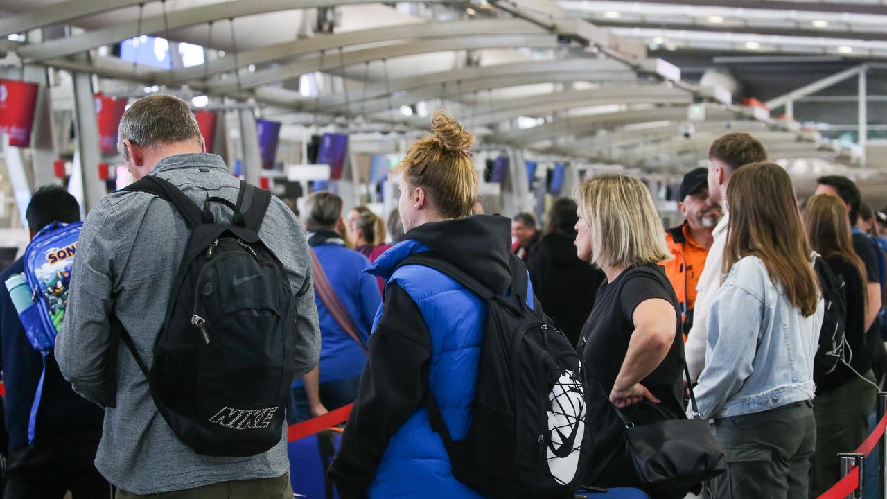 Long queues at Sydney Domestic Airport on the first day of school holidays. Picture: Gaye Gerard/NCA Newswire