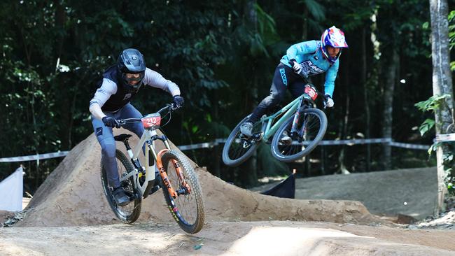 Ethan Aleckson and Max Turner go head to head in the U19 Men's Dual Slalom quarter finals at the first day of the Cairns round of the Crankworx World Tour, held at the Smithfield Mountain Bike Park. Picture: Brendan Radke