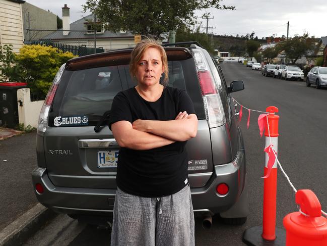 Jillian Mundy North Hobart resident is unhappy that the Hobart City Council has began painting parking spaces onto Strahan Street reducing the amount of actual spaces avaialable.  Picture: Nikki Davis-Jones