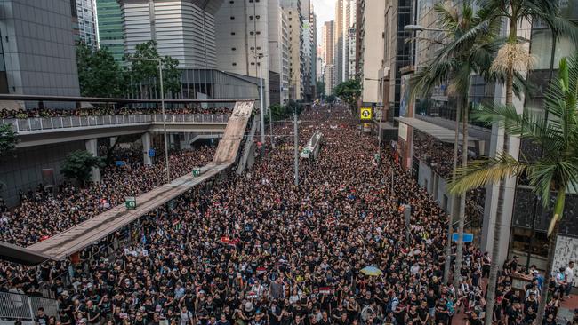 HONG KONG - JUNE 16: Protesters demonstrate against the now-suspended extradition bill on June 16, 2019 in Hong Kong. Large numbers of protesters rallied on Sunday despite an announcement yesterday by Hong Kong's Chief Executive Carrie Lam that the controversial extradition bill will be suspended indefinitely. (Photo by Carl Court/Getty Images) *** BESTPIX ***