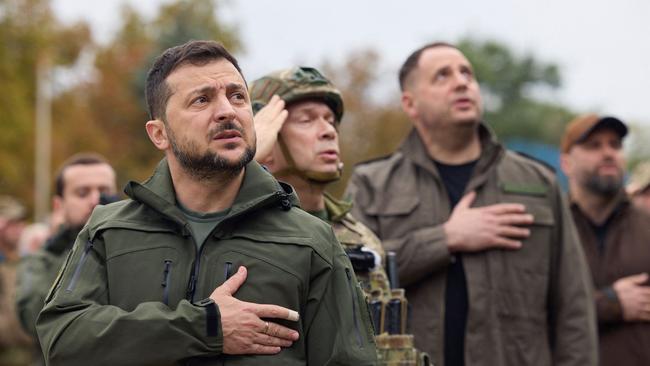 Ukrainian President Volodymyr Zelensky takes part in a flag-raising ceremony in the de-occupied city of Izyum, Kharkiv region. Picture: AFP