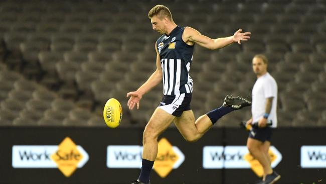 Julian Dobosz of Geelong kicks for goal during the AFL Community Championships at Etihad Stadium, Melbourne, Sunday, may 19, 2018. Eastern Football League v Geelong Football League. (AAP Image/James Ross)