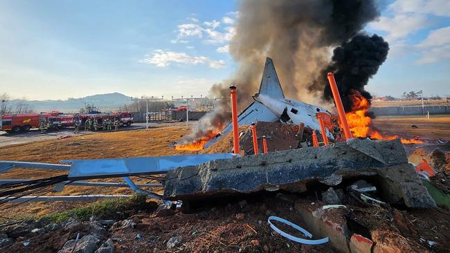 The burning wreckage of the Jeju Air jet at Muan airport on Sunday. Picture: AFP