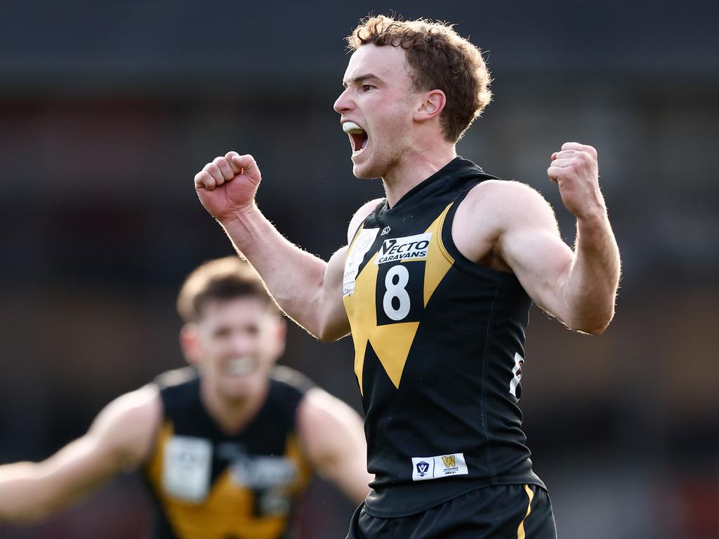 Jack Henderson celebrates a goal during the VFL Grand Final last year.