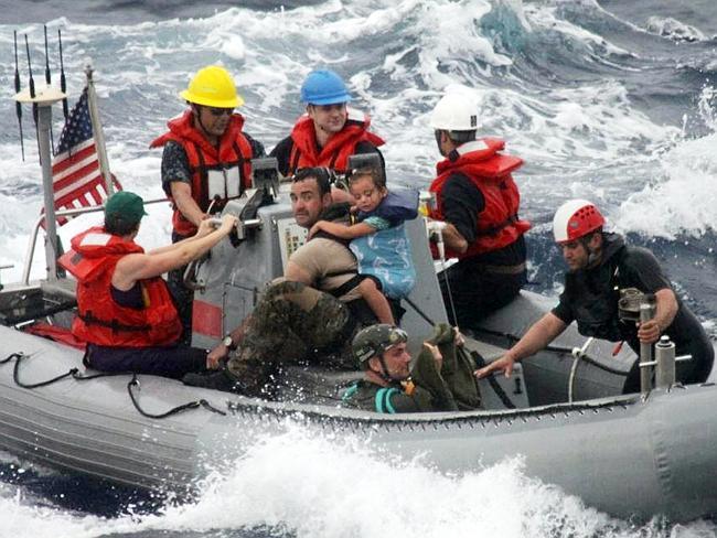 The family’s dramatic rescue by sailors from the USS Vandegrift. 