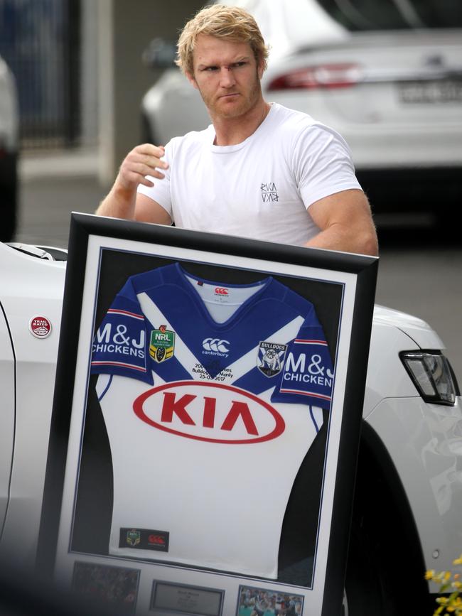 Bulldogs player Aiden Tolman leaves Belmore. Picture: John Grainger