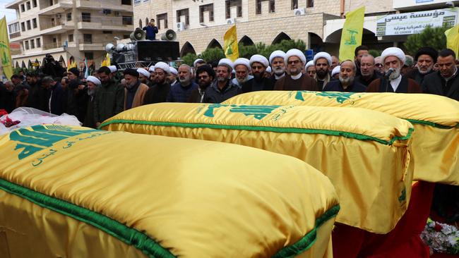 The coffins of alleged Hezbollah fighter Ali Bazzi and his two relatives who were killed in Israeli bombardment in the city of Bint Jbeil, in southern Lebanon near the border with Israel. Picture: AFP.