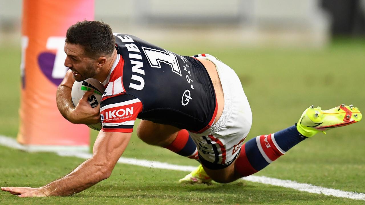 James Tedesco crosses for a try in the first half. Picture: Getty