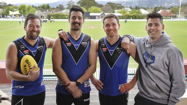 Unley Mercedes division two coach Kane Stewart with players, (L-R) co-captain Daniel Caire, vice captain Anthony Skara, and co-captain Blake Harris. Picture: AAP/Dean Martin