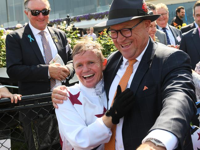 Barend Vorster and trainer Tony McEvoy celebrate after Sunlight won the Newmarket Handicap. Picture: Getty Images