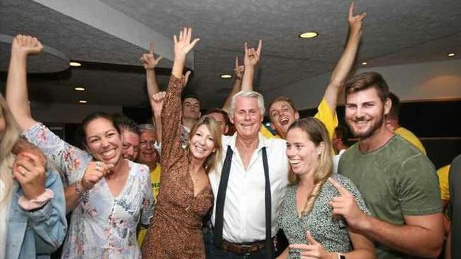 Geoff Provest celebrates his victory in retaining the seat of Tweed.