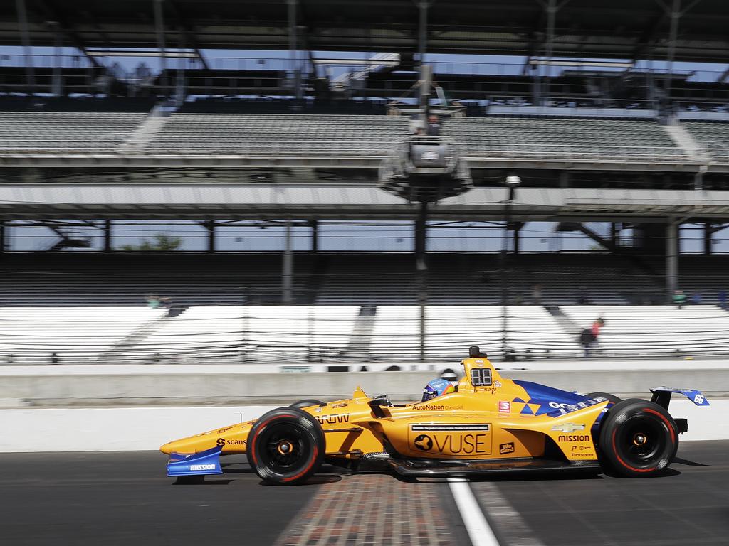 Fernando Alonso leaves the pits during practice for the Indianapolis 500. (AP Photo/Darron Cummings)