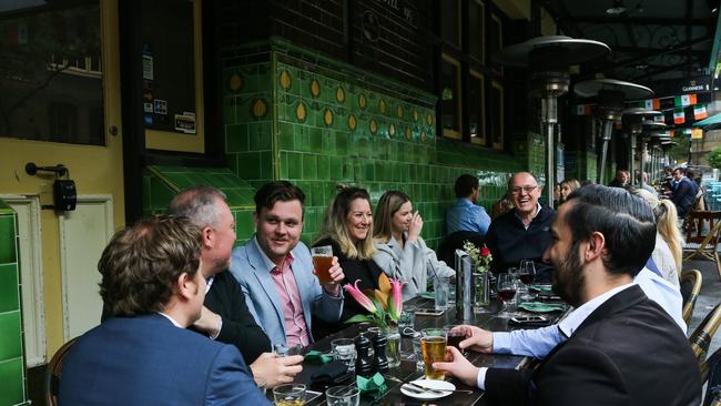 SYDNEY, AUSTRALIA - NewsWire Photos, OCTOBER 11 2021: Excited patrons enjoy their first beer back at the Mercantile Pub in the Rocks as Pubs reopen in Sydney on "Freedom Day". in Sydney. Picture:  NCA NewsWire / Gaye Gerard