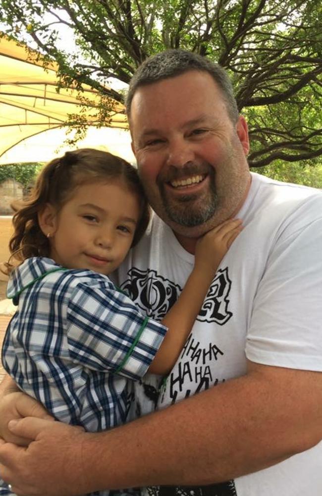 Buddy, with his daughter Jhayda, 7, before his illness. Picture: Supplied.