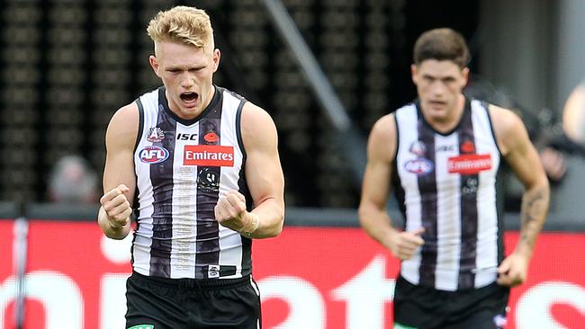 Magpie Adam Treloar celebrating a goal on Anzac Day. Picture: Michael Klein