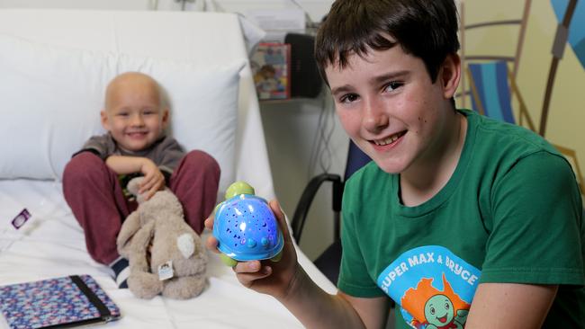 Bryce U'Ren 11yrs from Burleigh Heads has been nominated for a Pride of Australia award for his work fundraising and handing out nightlights to sick kids in hospitals, Bryce is pictured at the Lady Cilento Children's Hospital with patient Tanner Lousick 4yrs from Cairns, Brisbane Thursday 13th September 2018 Picture AAPimage/David Clark