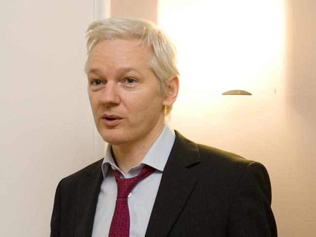 Julian Assange arrives for a meeting with French politician Jean Luc Melenchon inside the Ecuadorean in 2012. Picture: AFP.