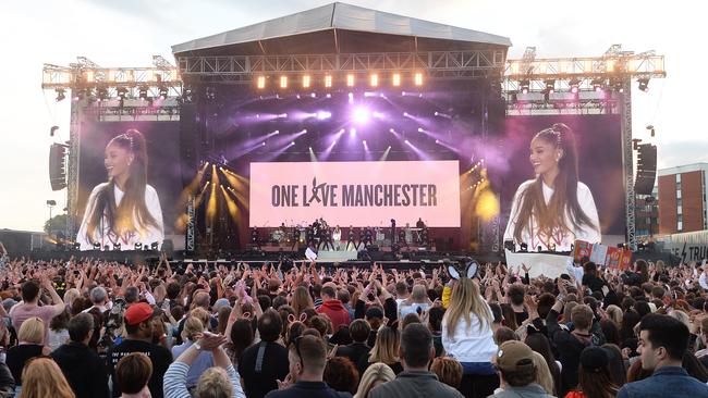 Grande performs on stage for her One Love memorial concert. Picture: Getty Images / Dave Hogan.