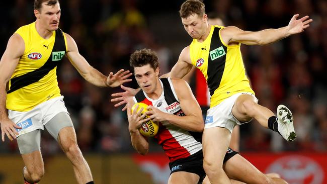 Jack Steele wins the hard ball ahead of Jake Aarts and Kamdyn McIntosh. Picture: Dylan Burns/AFL Photos via Getty Images