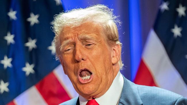 US President-elect Donald Trump gestures as he attends a meeting with House Republicans at the Hyatt Regency hotel in Washington, DC on November 13, 2024. (Photo by Allison ROBBERT / AFP)