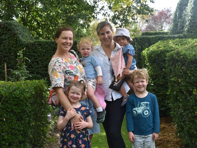 Helen and Caroline from Stanthorpe and the Sunshine Coast enjoying the open garden at 54 Lock Street with Samson, Cecilia, Xavier and Poppy at the Apple and Grape Festival. February 25, 2024