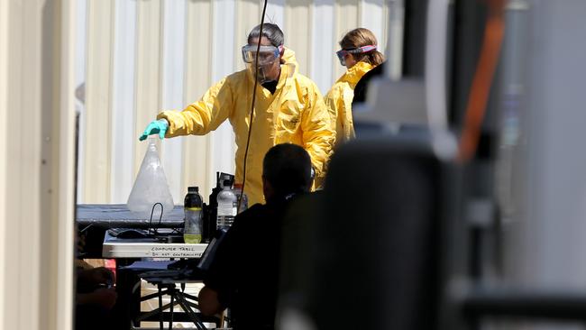 South Australian police working at the scene of a meth lab bust in Adelaide. Picture: AAP / Kelly Barnes