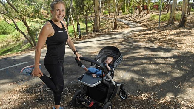 Marathon runner Jess Trengove with son Billy. Picture: Tom Huntley