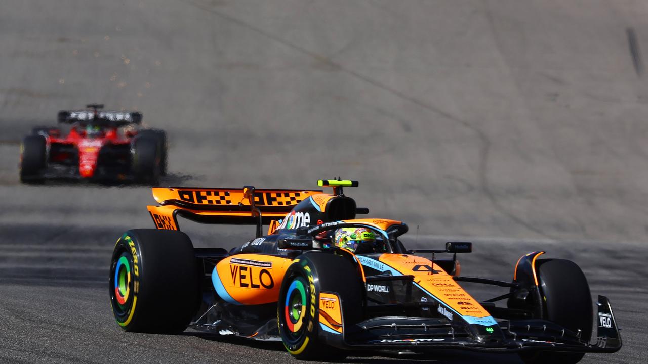 Lando Norris leads Charles Leclerc in the early stages of the race. Picture: AFP