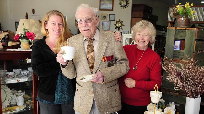 Merton Cooke with his granddaughter Jackie Sims and daughter Lesley Sims at their second hand shop Memory Lane. Picture: Waide Maguire.