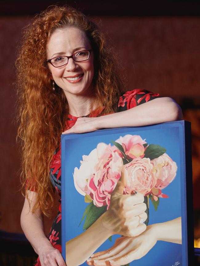 Deaf theatre actor Ana Maria Belo is pictured with her name in Auslan.