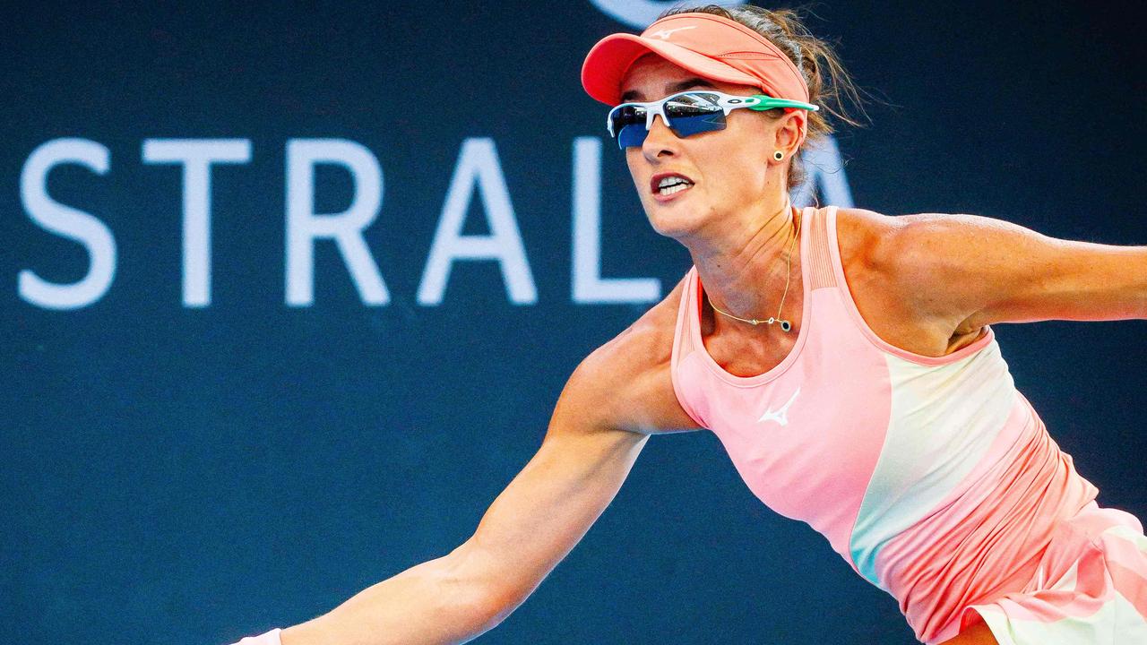 Australia's Arina Rodionova hits a return at the Brisbane International. Photo by Patrick HAMILTON / AFP.