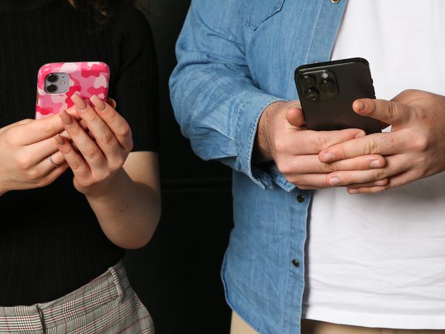 SYDNEY, AUSTRALIA : Newswire Photos AUGUST 28 2023: Patrick Blacker and Aaliyah Johnston, both 20, in Sydney with their phones. A case study on Gen Z and their phone use and why they prefer to text rather than speak on the phone. Picture: NCA Newswire/ Gaye Gerard