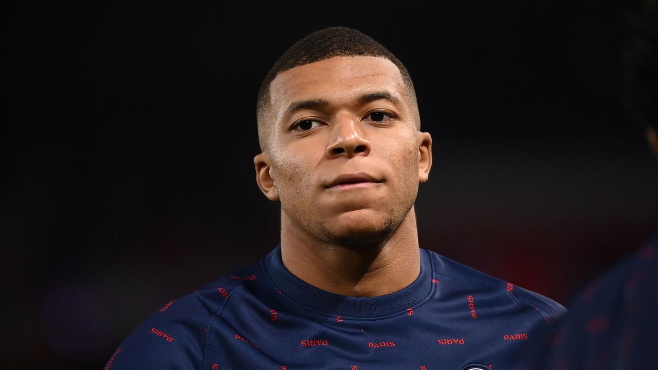 Paris Saint-Germain's French forward Kylian Mbappe warm up prior the UEFA Champions League first round group A football match between Paris Saint-Germain's (PSG) and Manchester City, at The Parc des Princes, in Paris, on September 28, 2021. (Photo by FRANCK FIFE / AFP)
