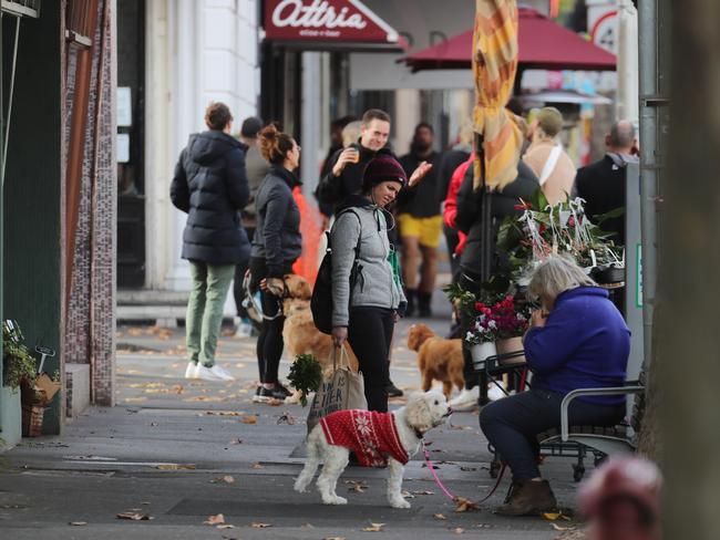 Melburnians without masks on Richmond’s Swan Street. Picture: Alex Coppel