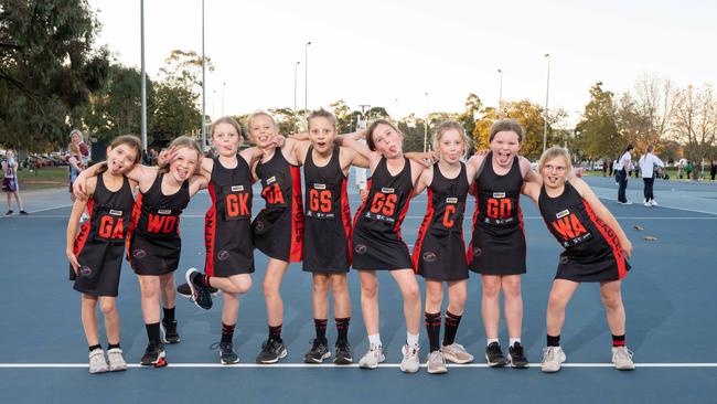 Newtown McBain under-11 netball team pull their funniest faces.