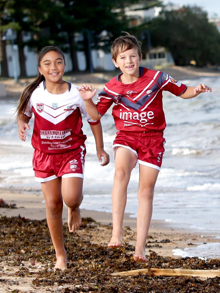 Suede Miru Soloai and Jesse Green in Dolphins colours. Picture: Steve Pohlner