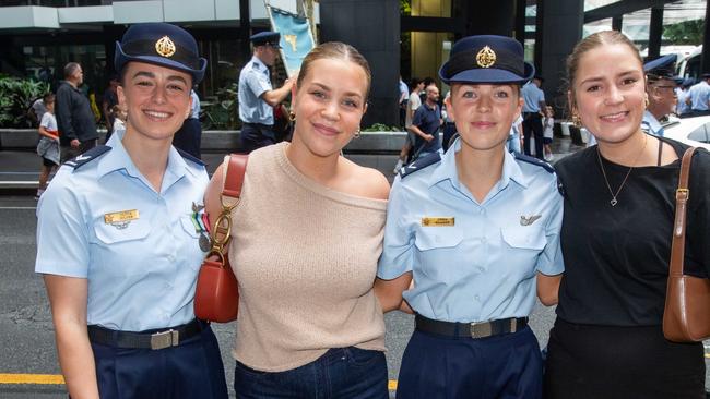 Thousands of people have braved the rain to gather in Brisbane for Anzac Day services. Picture: Grace Kessels