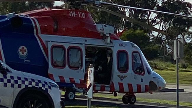 An air ambulance arriving at Cranbourne East after a toddler fell out of a reversing car.