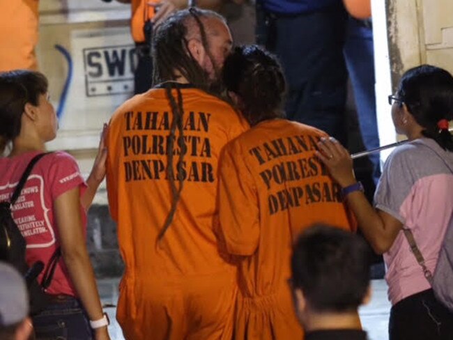 The orange outfits have the Indonesian word for suspect on the back. Picture: Zul Edoardo.