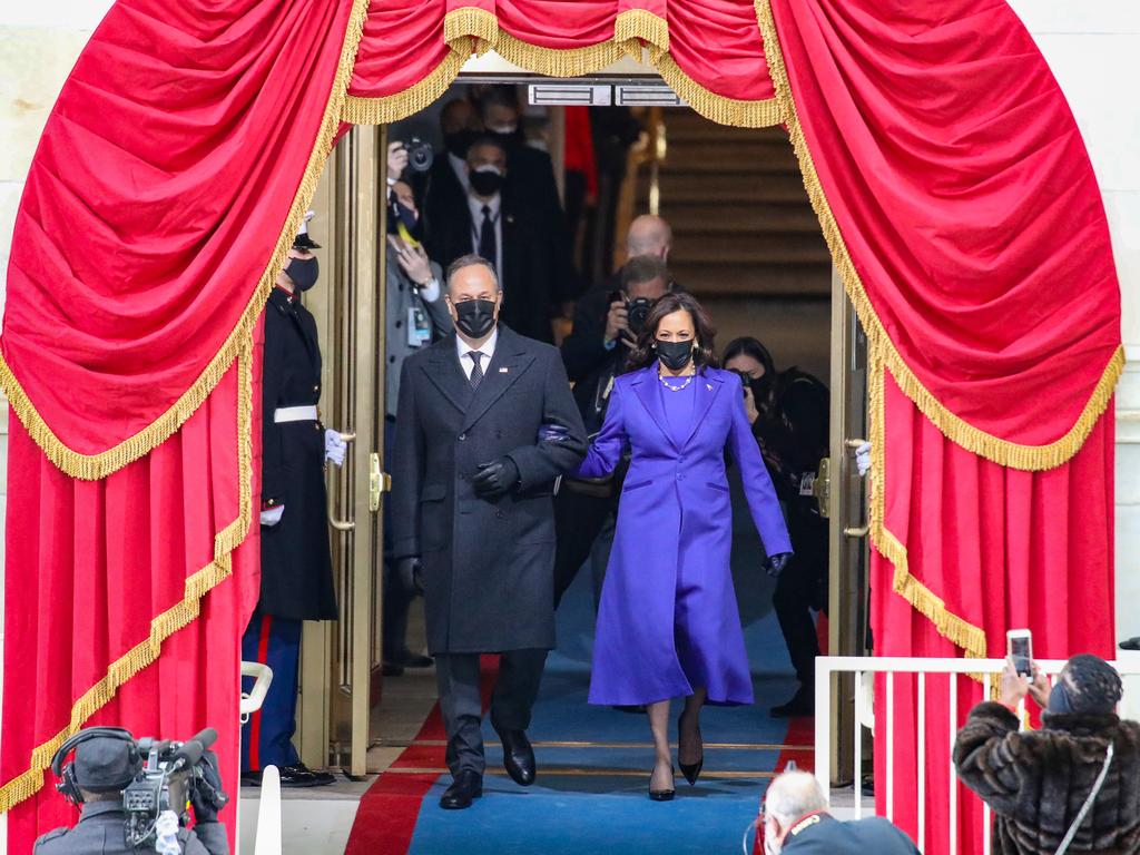 Vice president-elect Kamala Harris and husband Doug Emhoff arrive. Picture: Rob Carr/Getty Images