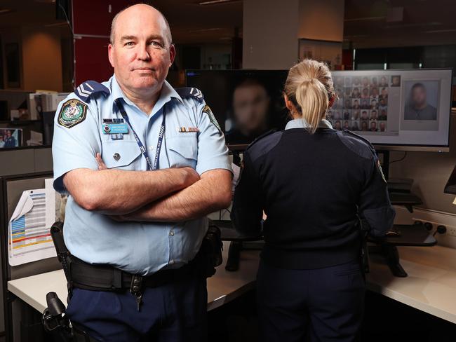 Senior Constable Anthony Pickering takes The Saturday Telegraph behind the scenes of the Facial Recognition Unit. Pic: Tim Hunter