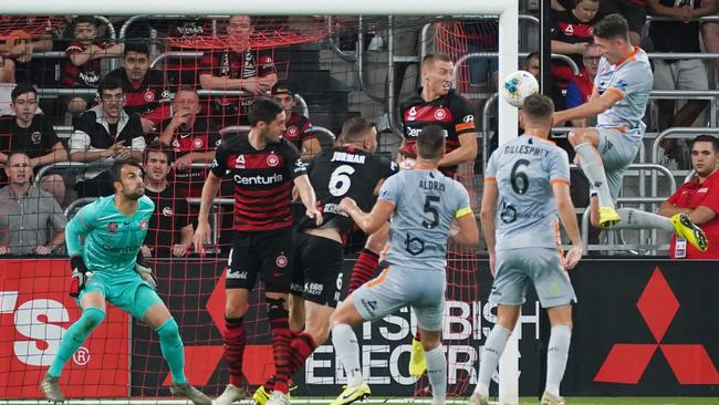 Scott Neville of the Roar scores the first-half equaliser for the Roar Picture: AAP