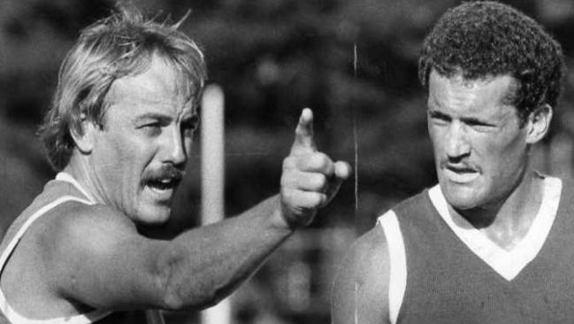 Malcolm Blight calls the shots at training during his short reign as North Melbourne coach in 1981.