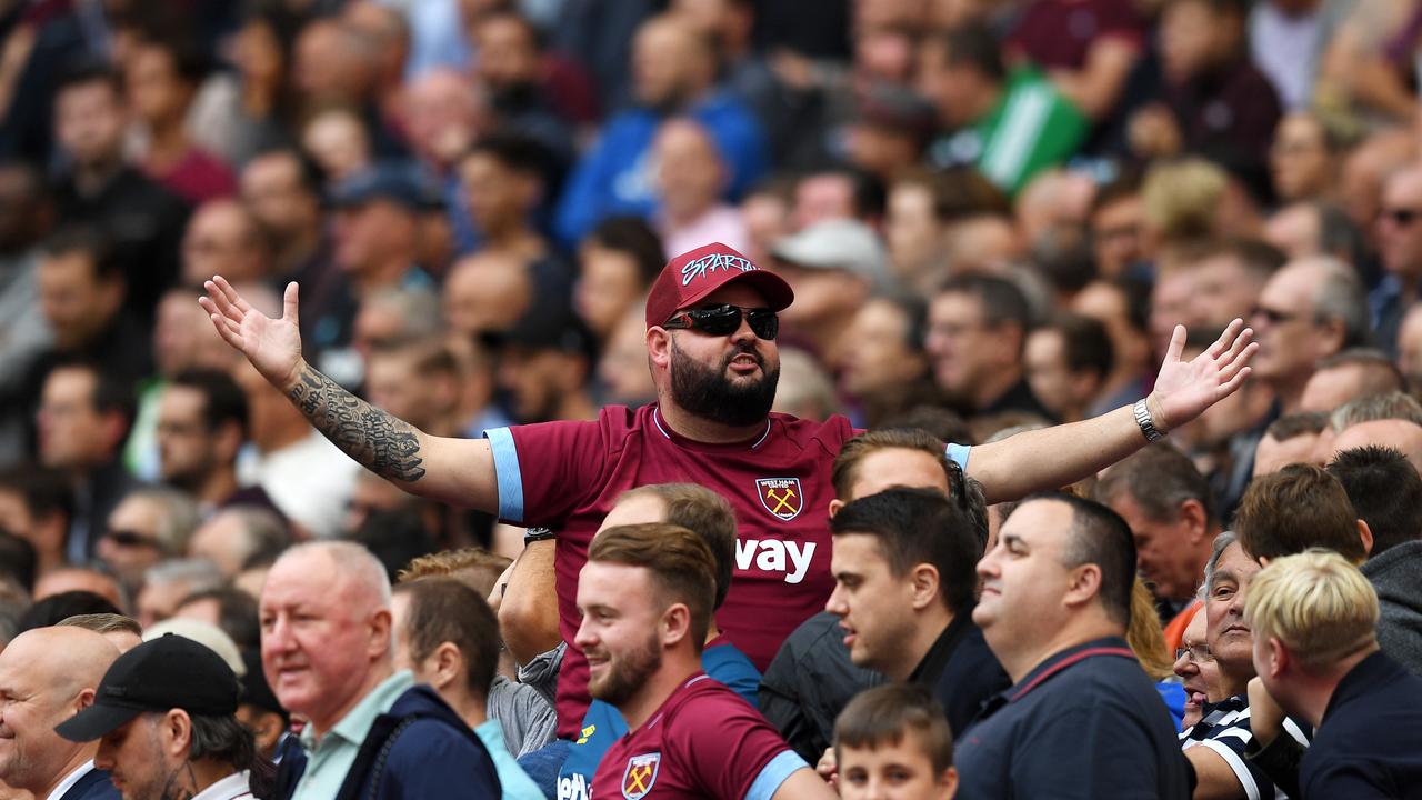 A West Ham fan doesn't look too happy.