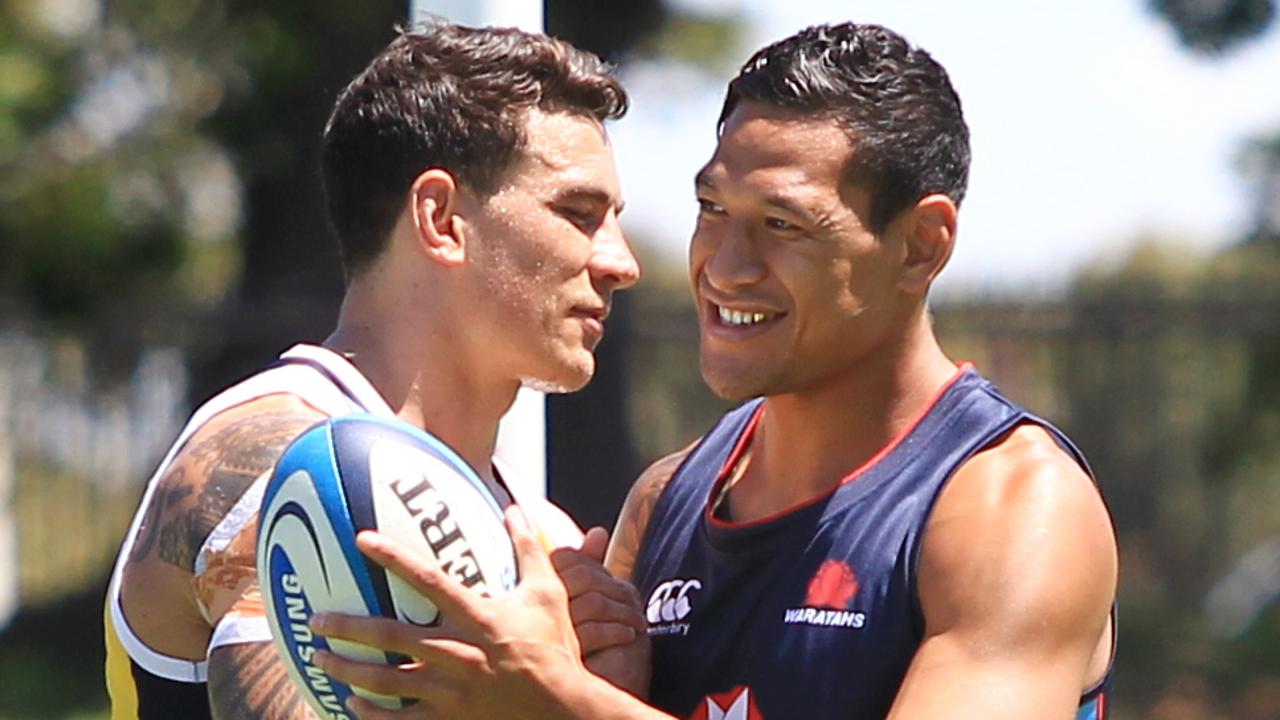 Sonny Bill Williams greets Waratah Israel Folau at a training session in 2013