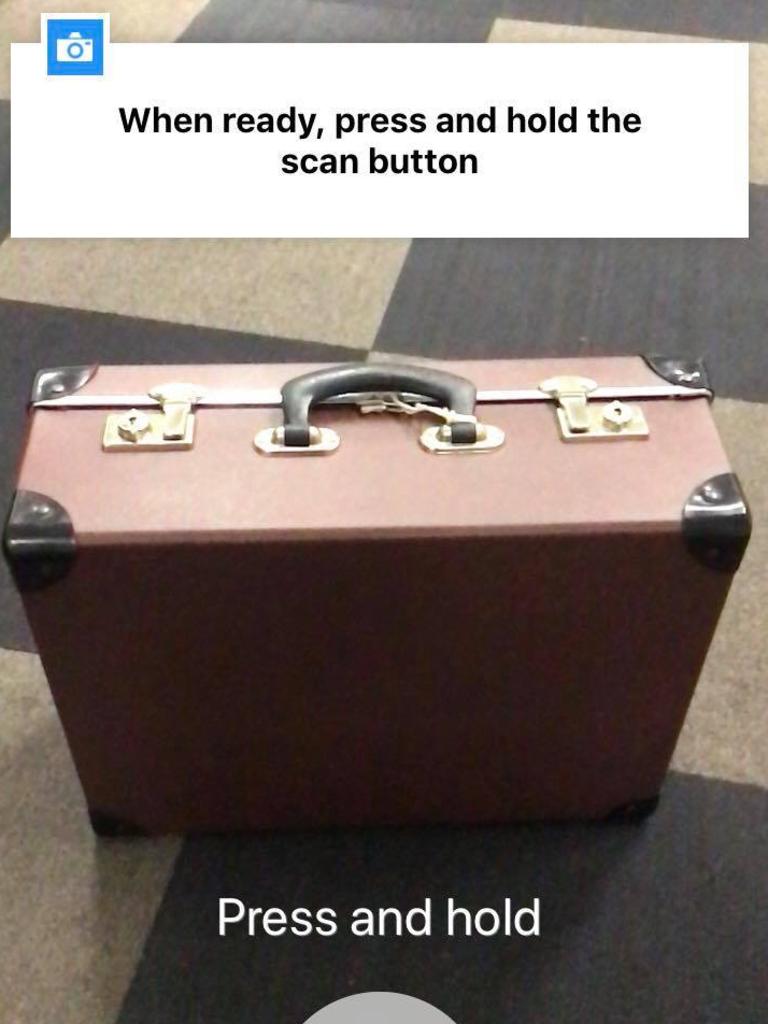 All you need to do is scan the bag with your phone camera. (FYI: this old-timey suitcase is purely decorative.)